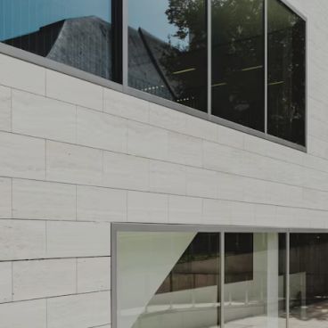 Exterior of a modern building featuring clean lines and glass architecture