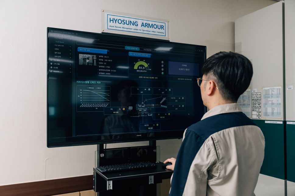 Researcher reviewing real-time data on Hyosung’s ARMOUR substation asset management platform