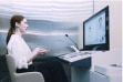 Customer receiving remote financial consultation using Hyosung TNS’s world-first digital kiosk solution, Digital Desk®
